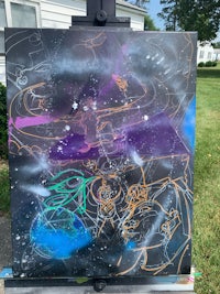 an easel with a painting on it